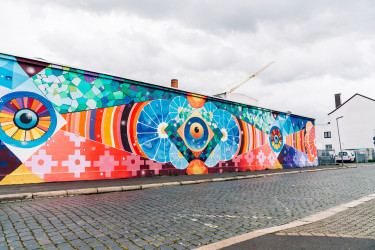 Mural von KOSMON Project in Kassel